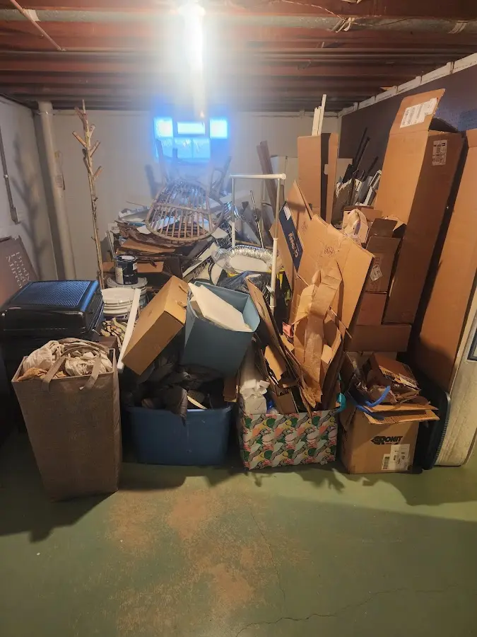 Roll-off dumpster container at job site for Concrete Dumpster Rental in Alma